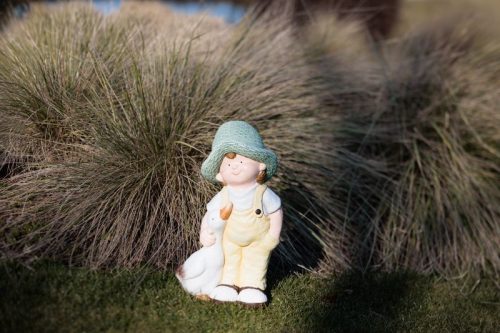 Dekoráció MagicHome, Fiú libával, kerámia, 15,5x25,5x44,5 cm